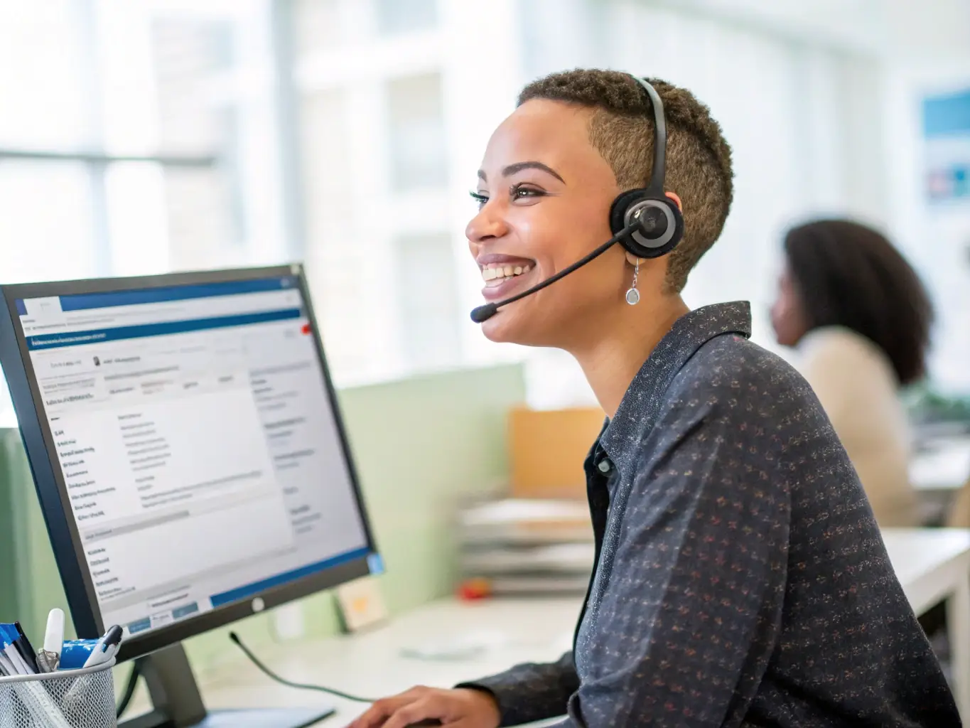 A friendly Russian-speaking customer support agent assisting a customer via video call, illustrating the personalized and readily available support offered by Nikar Home.